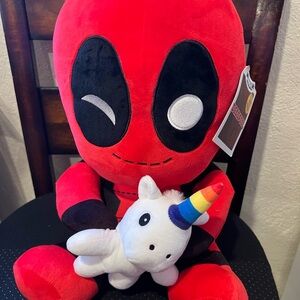 Red and Black Plush Toy with Unicorn